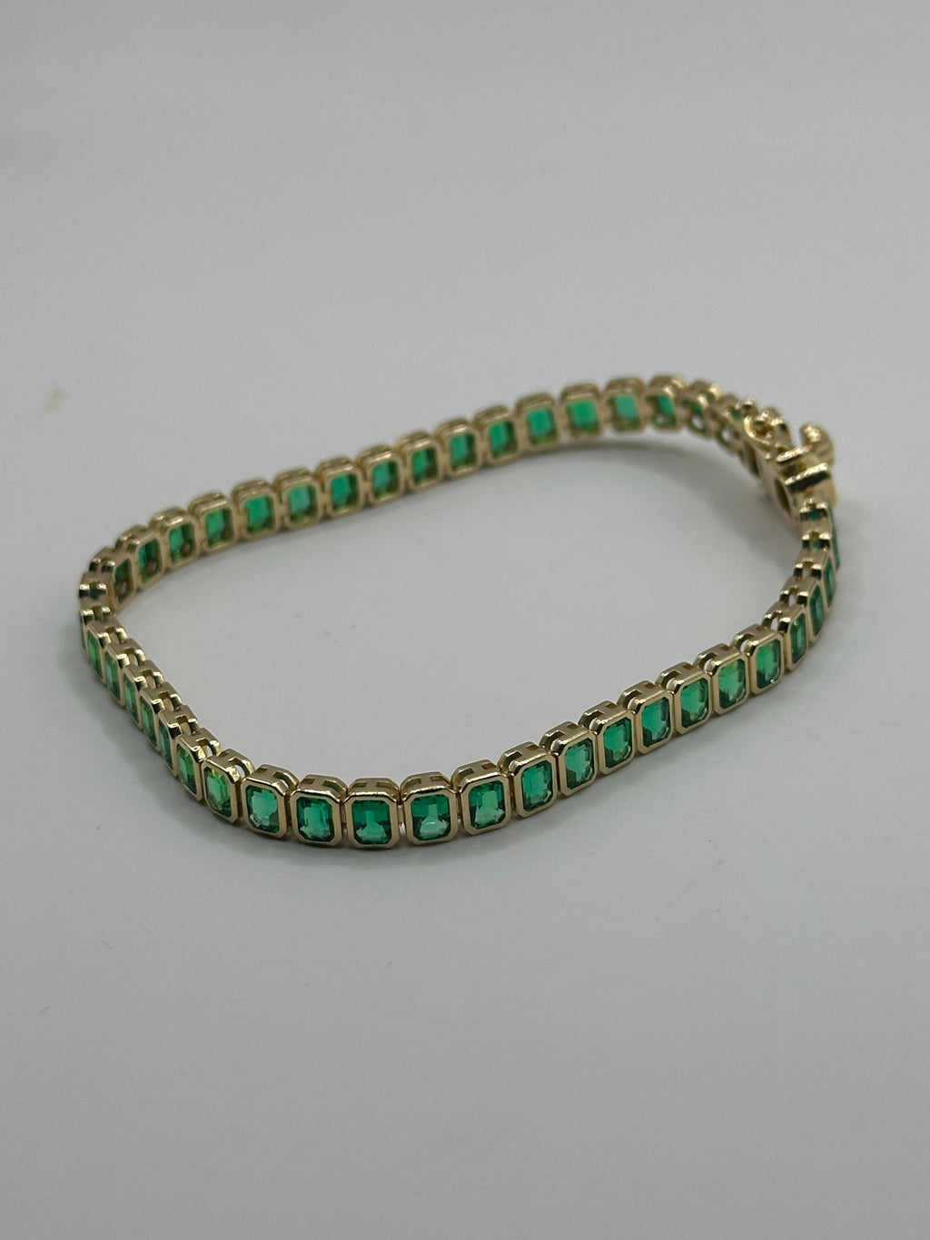 Esclava de esmeraldas con oro